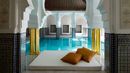 Relax after your hammam treatment on a daybed suspended above the mosaic-tiled pool. (La Mamounia) (Credit: La Mamounia) Relax after your hammam treatment on a daybed suspended above the mosaic-tiled pool. (La Mamounia) (Credit: La Mamounia)