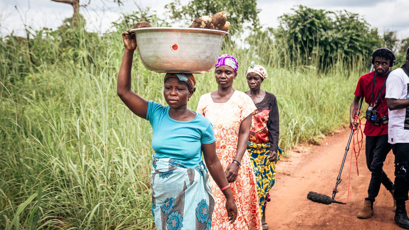 Woman walking with produce Woman walking with produce