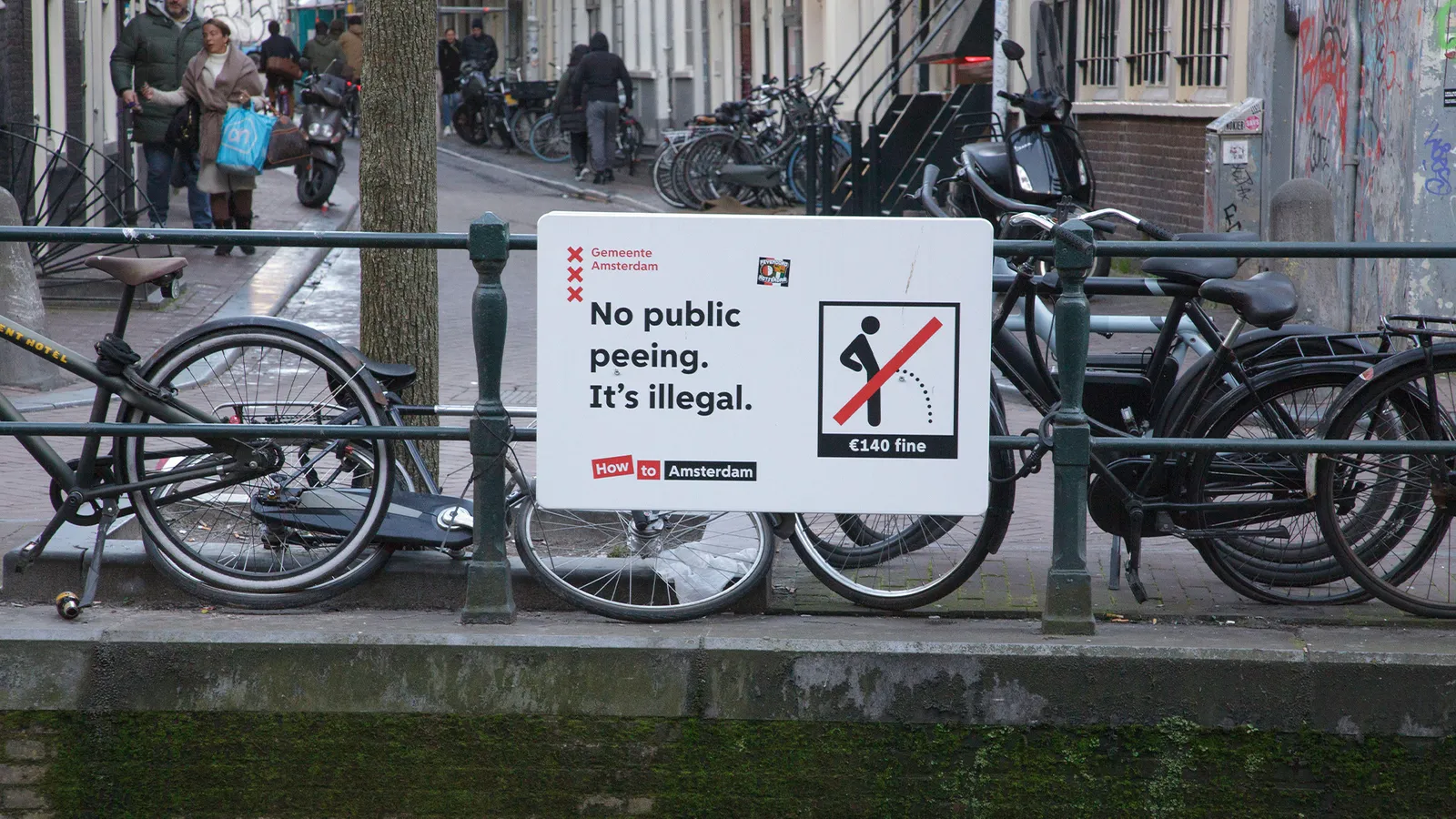 Sign in Amsterdam: no public peeing on the streets, 140 euro fine.