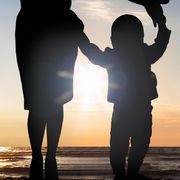File image of the silhouettes of a mother and child thumbnail
