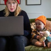 File image of a mum working next to her child thumbnail