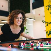 An office worker playing table football thumbnail