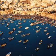 Aerial view of the boats at Marsaxlokk harbour in Malta thumbnail