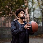 Man shooting a basket thumbnail
