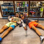 Men passed out in front of a store thumbnail