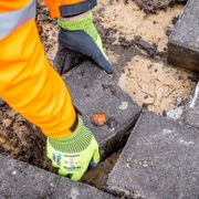 Workers depave a stretch of concrete in Leuven, Belgium thumbnail