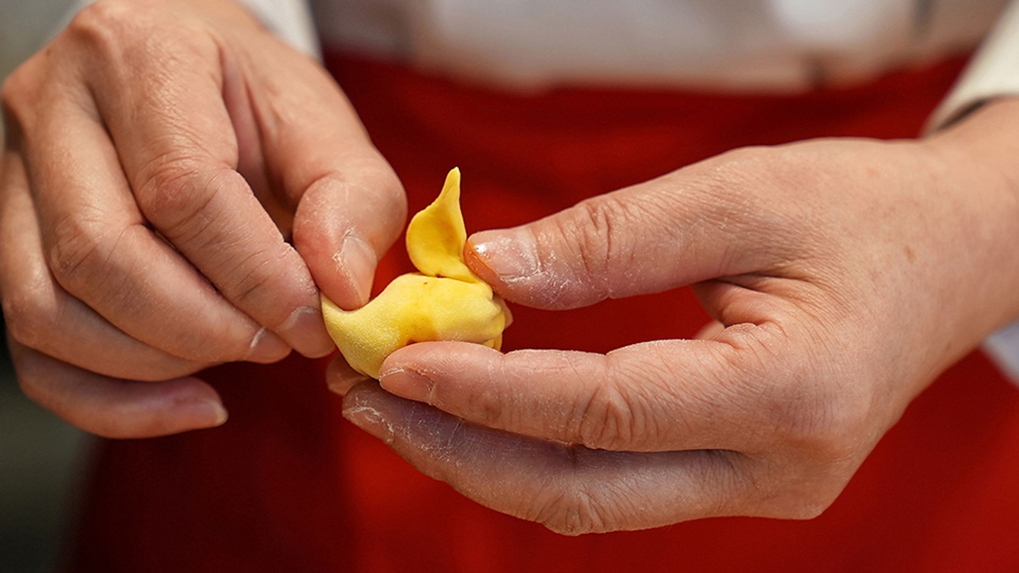A jiaozi master makes a duck-shaped dumpling