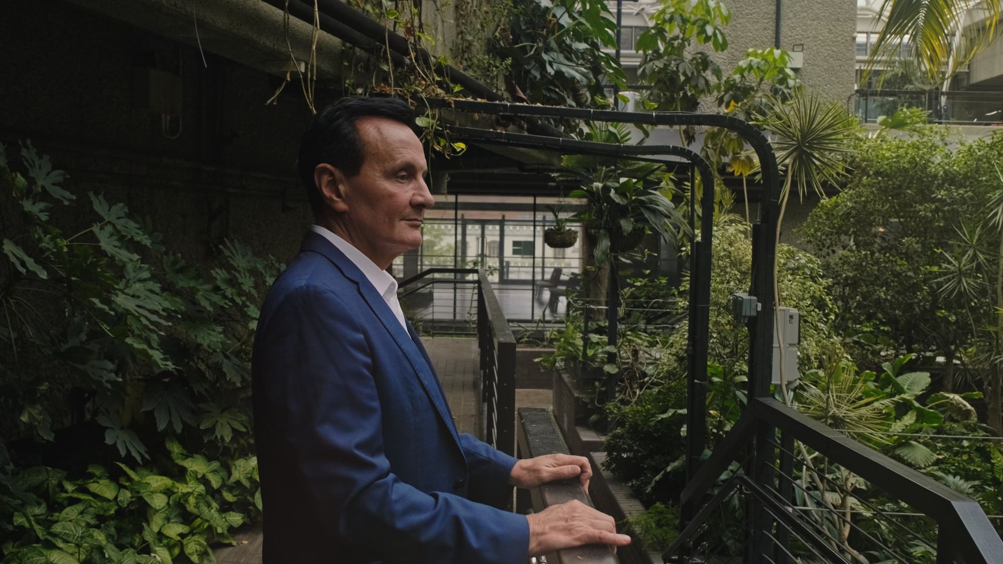 A man is looking out at nature A man is looking out at nature