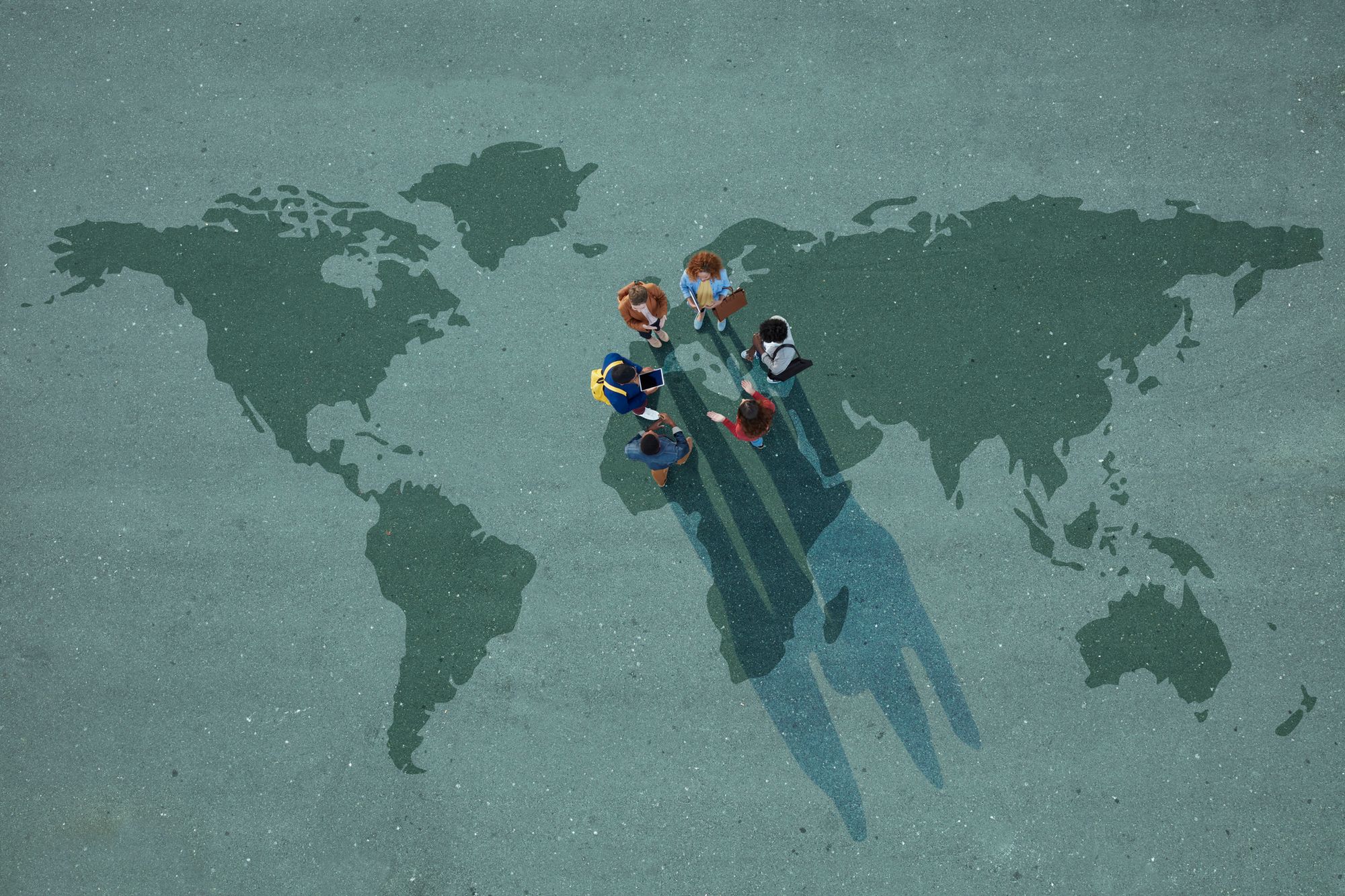 Standing on a huge world map