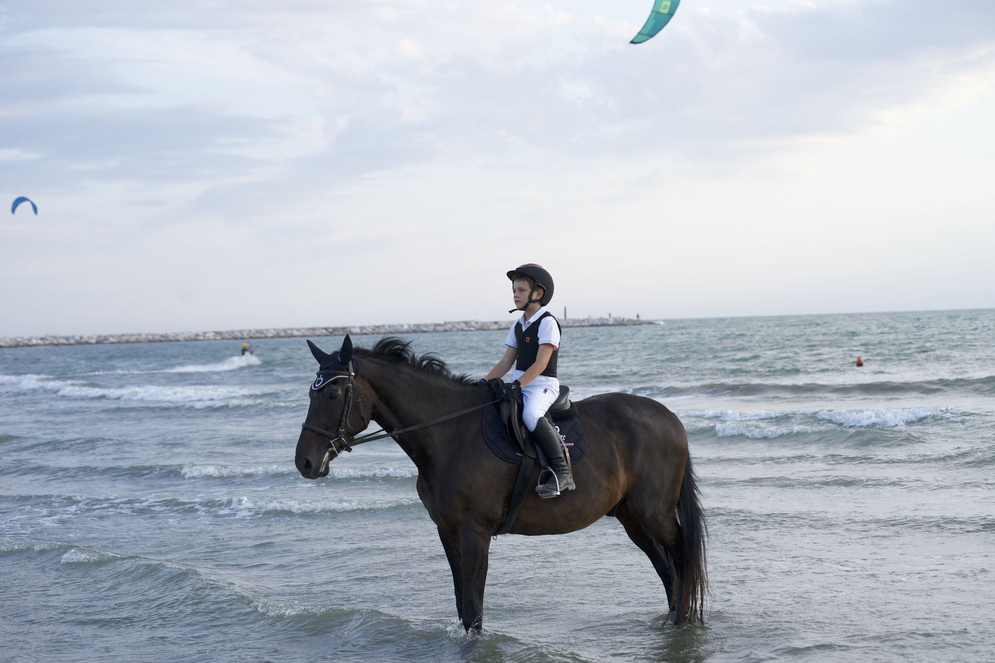 Boy on a horse on the beach Boy on a horse on the beach