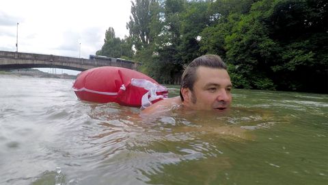 The man who swims to work