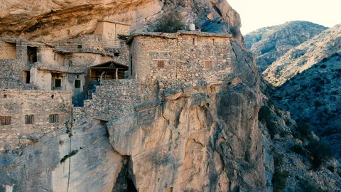 A hidden village carved into a cliff