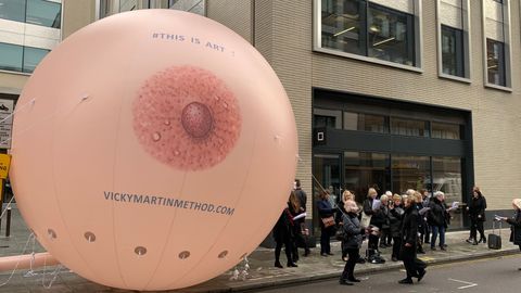 Huge inflatable breast outside Facebook