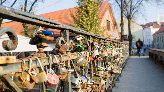 Once a year, on April 1, travellers can get their passports stamped as they cross the bridge into Užupis (Credit: Credit: Luis Dafos/Alamy) Once a year, on April 1, travellers can get their passports stamped as they cross the bridge into Užupis (Credit: Credit: Luis Dafos/Alamy)
