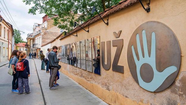 The symbol of Užupis is the Holy Hand, a blue hand with a hole in the middle, making it unable to accept bribes (Credit: Credit: Hemis/Alamy) The symbol of Užupis is the Holy Hand, a blue hand with a hole in the middle, making it unable to accept bribes (Credit: Credit: Hemis/Alamy)