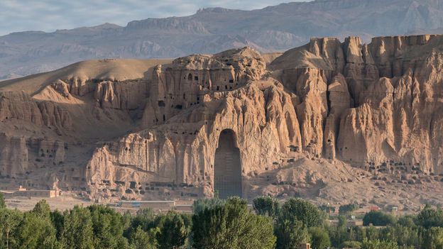 Today, all that remains of the two 6th-Century AD Buddha statues once carved into the Bamiyan cliff is an empty cavity (Credit: Credit: picassos/Getty Images)