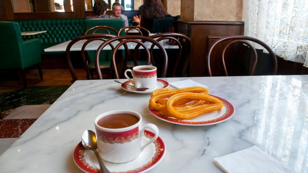 Churros and chocolate is especially popular in Madrid (Credit: Credit: Maria Galan Still/Alamy) Churros and chocolate is especially popular in Madrid (Credit: Credit: Maria Galan Still/Alamy)