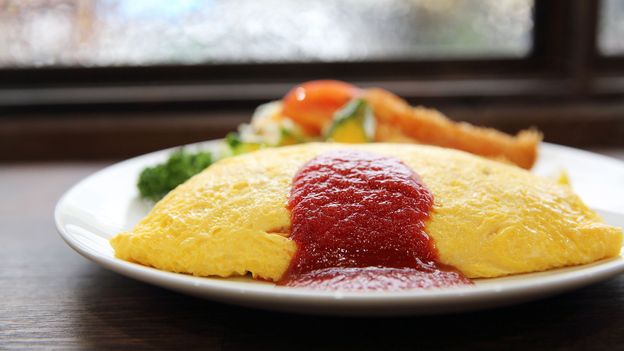 Omurice is an omelette stuffed with rice and served with ketchup (Credit: Credit: piyato/Getty Images)