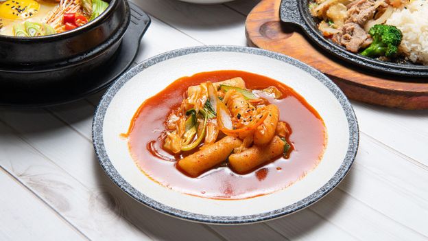 Tteokbokki, a tongue-blistering rice cake dish, is made with gochujang paste (Credit: Credit: yao chung hsu/Alamy)