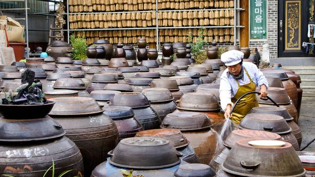 Gochujang is fermented in massive clay pots called onggi (Credit: Credit: Michele Burgess/Alamy)