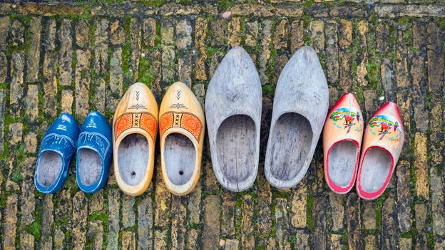 Clogs have been worn for centuries in the Netherlands by farmers, and remain an important part of Dutch heritage (Credit: Credit: George Pachantouris/Getty Images) Clogs have been worn for centuries in the Netherlands by farmers, and remain an important part of Dutch heritage (Credit: Credit: George Pachantouris/Getty Images)