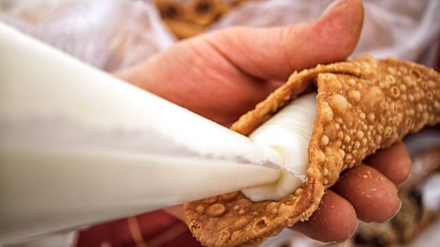 Pastry chef Corrado Assenza fills his cannoli shells to order, so they remain crispy (Credit: Credit: JannHuizenga/Getty Images)