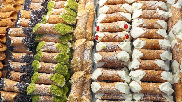 Over time, most Sicilian cannoli have changed in flavour and ingredients – and have spread worldwide (Credit: Credit: ChiccoDodiFC/Getty Images)