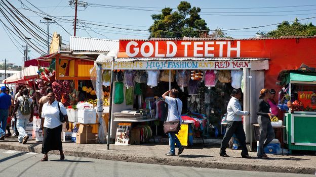 In Trinidad & Tobago, street food vendors hawk different foods and wares (Credit: Credit: Tony Boydon/Alamy) In Trinidad & Tobago, street food vendors hawk different foods and wares (Credit: Credit: Tony Boydon/Alamy)