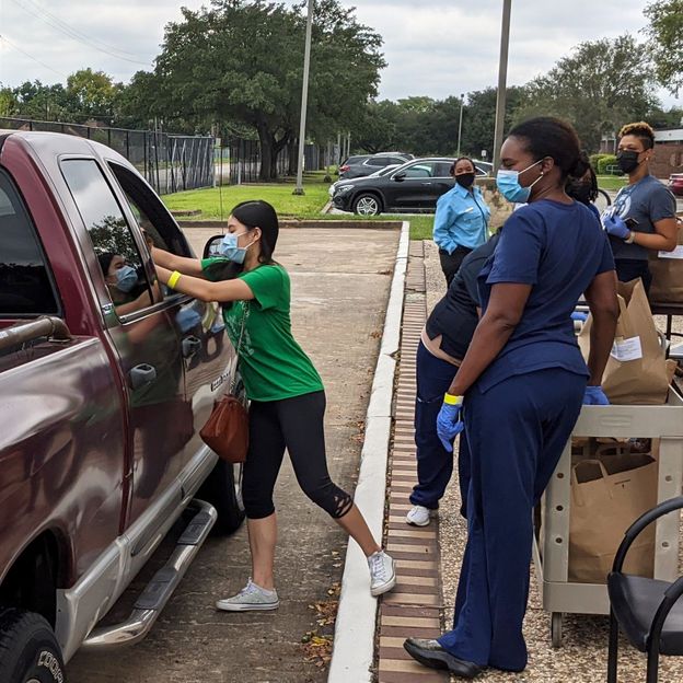 As restrictions eased during the pandemic, people were able to pick up food at drive in stations organised by Fresh Hub (Fresh Hub)