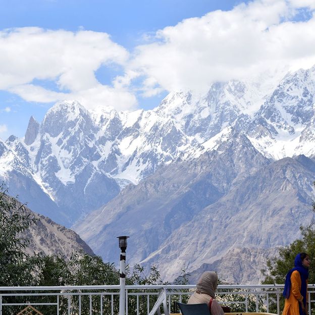 Shahzadi serves up a storm of regional dishes against the mountain backdrop of Hunza (Credit: Aysha Imtiaz)