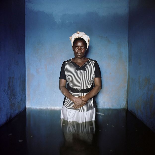 Florence Abraham, Igbogene, Bayelsa State, Nigeria, November 2012, from the series Drowning World (Credit: Gideon Mendel)