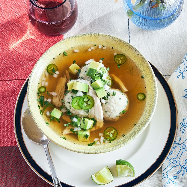 This take on matzah ball soup includes Mexican flavours such as chillies, coriander and avocado (Credit: Penny De Los Santos) This take on matzah ball soup includes Mexican flavours such as chillies, coriander and avocado (Credit: Penny De Los Santos)