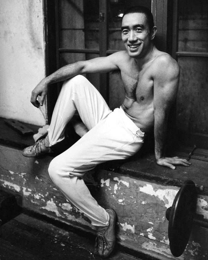 In his later years, Mishima took up bodybuilding to add bulk to his frail physique (Credit: Getty Images)