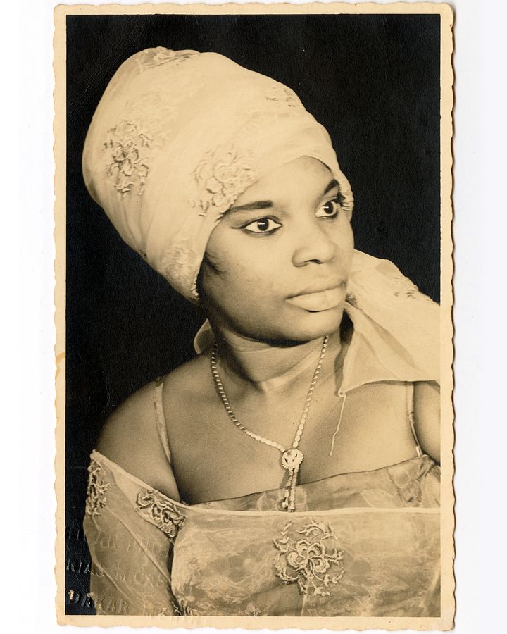 Mama Casset, photographed in 1960 in a studio in Senegal (Credit: Courtesy of The McKinley Collection/The African Lookbook)