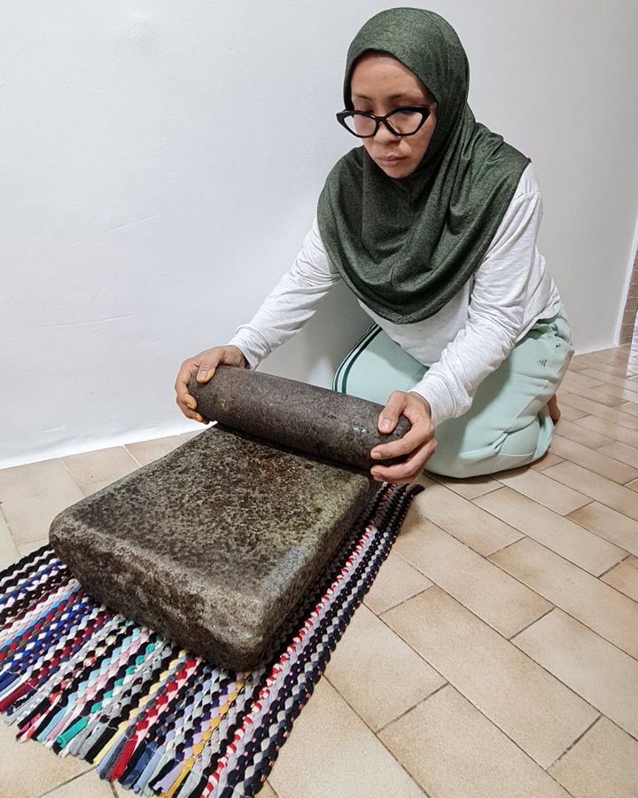 Asnida Daud's late grandmother's batu giling (mealing stone) is now a prized family heirloom (Credit: Asnida Daud)