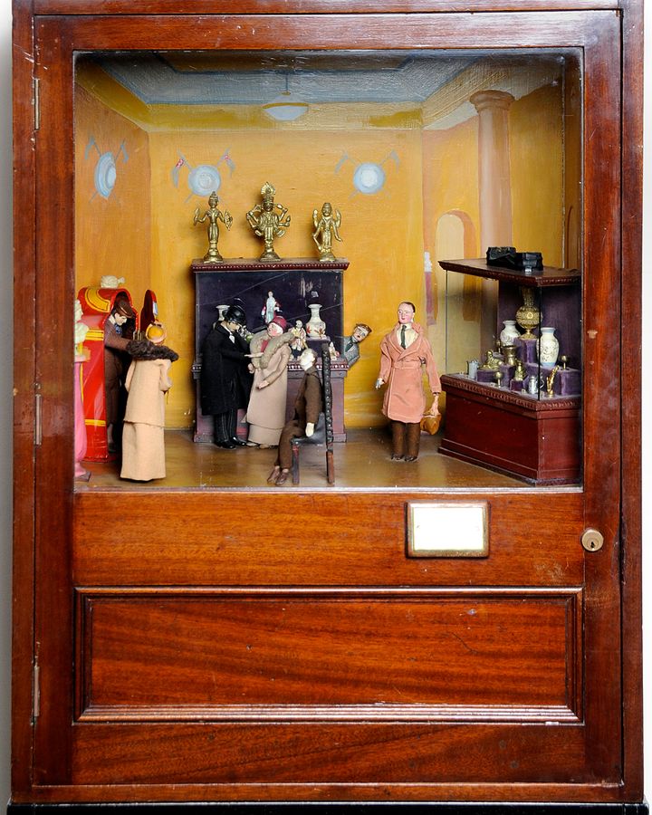 A 1930s slot machine called "Murder in the Museum: who killed the man in the chair?" is on display at Abbey House Museum in Leeds (Credit: Leeds Museums)