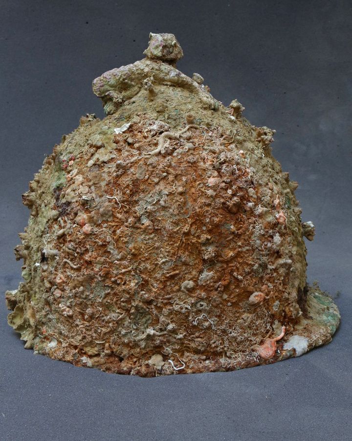 Around 40 ancient war helmets also were recovered by the archaeologists (Credit: Salvo Emma/Soprintendenza del Mare)
