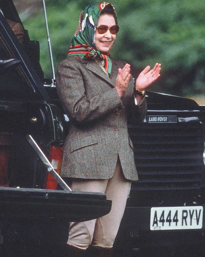 The Queen's enduring off-duty look, shown here at the 1988 Royal Windsor Horse Show, has been much copied by fashionistas (Credit: Getty Images)