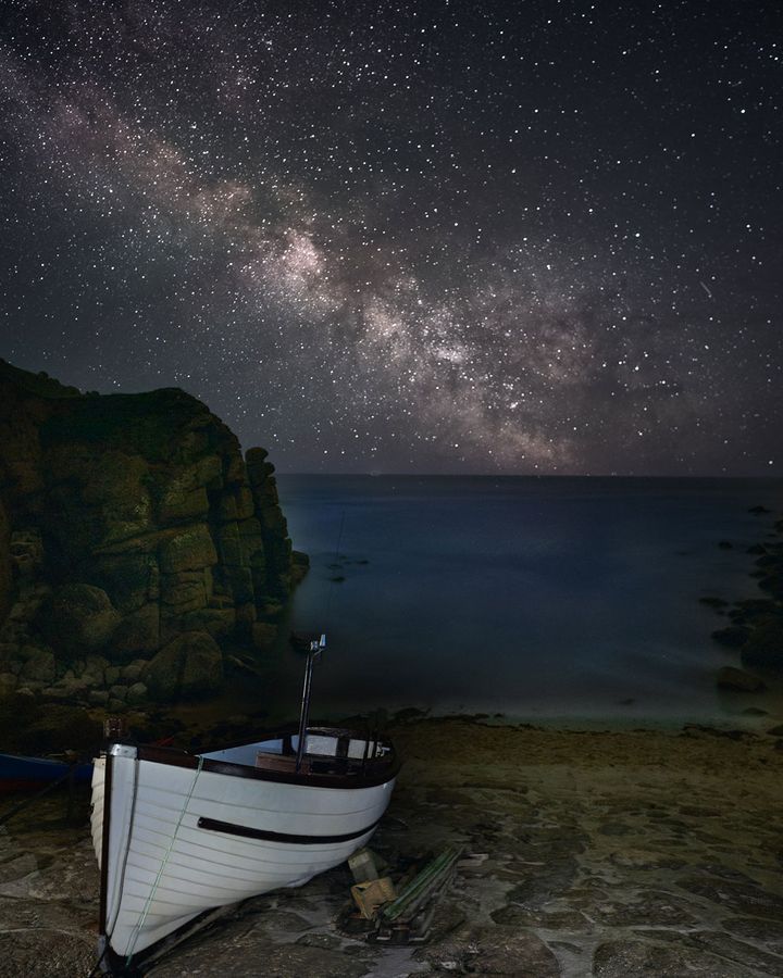 A starry night sky at Porthgwara Beach in Cornwall (Credit: Chris Colyer)