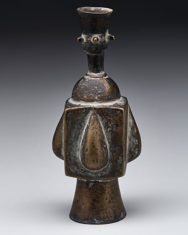 A small bronze bottle originating from 9th to 10th Century Iran has clean lines and geometric motifs (Credit: Keir Collection, on loan to Dallas Museum of Art)