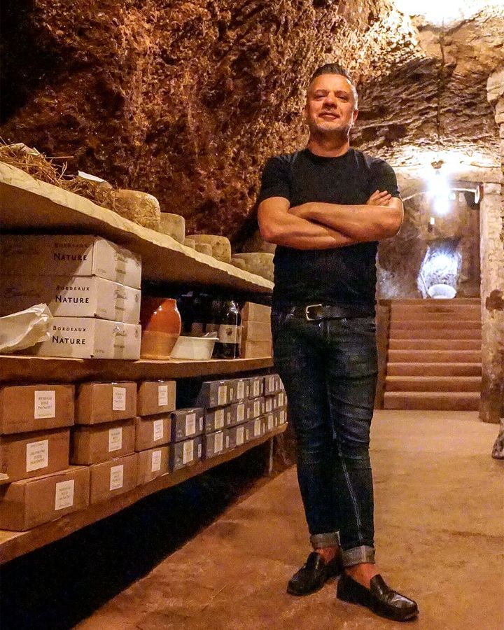 Massimo Innocenti stores pecorino in Necci dal 1924's 2,000-year-old cave (Credit: Marina Pascucci)