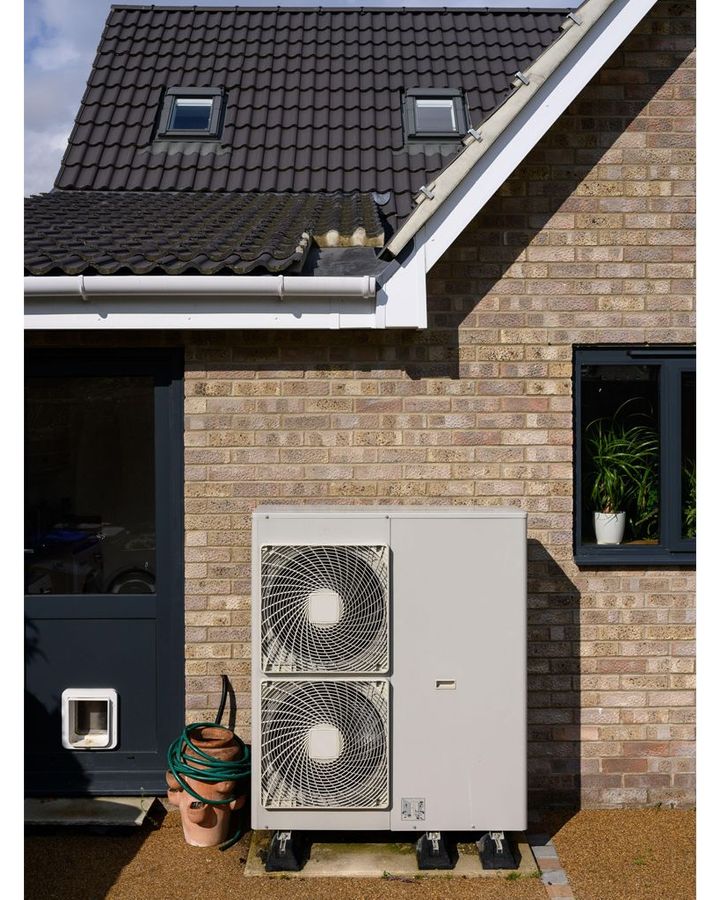 It's far more common to see air-source heat pumps on individual houses than apartment blocks (Credit: Mark Morgan/Alamy)