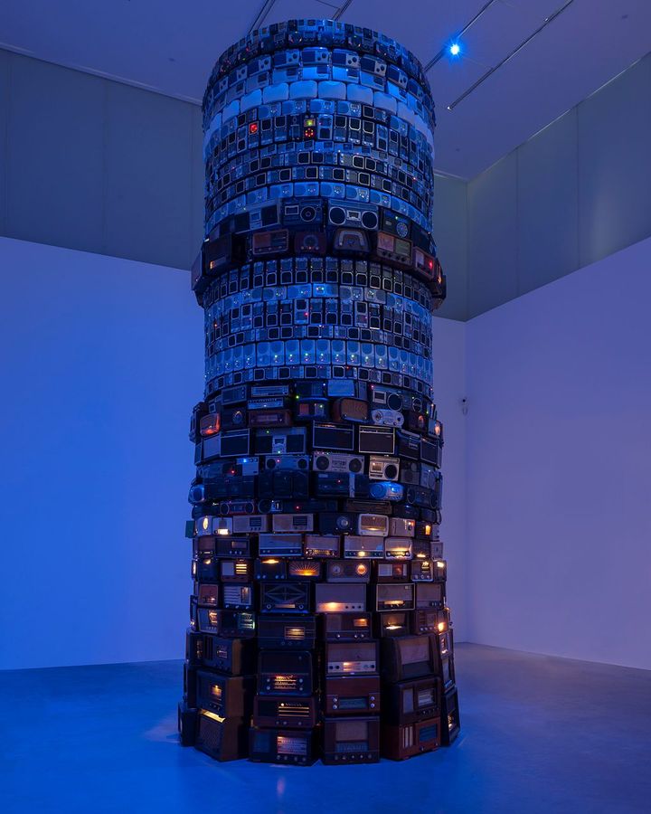 The totemic artwork Babel, 2001, by Brazilian artist Cildo Meireles is a tower of hundreds of analogue radios, all tuned to different stations (Credit: Cildo Meireles/ Tate)