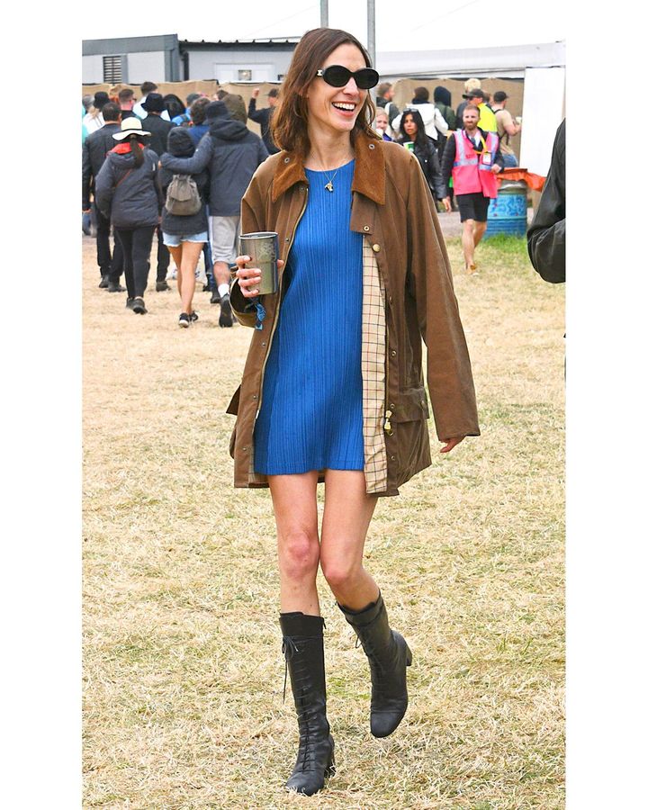 In the 1990s and 2000s, the iconic waxed jacket became synonymous with Glastonbury - It girl Alexa Chung later collaborated with the brand (Getty Images)