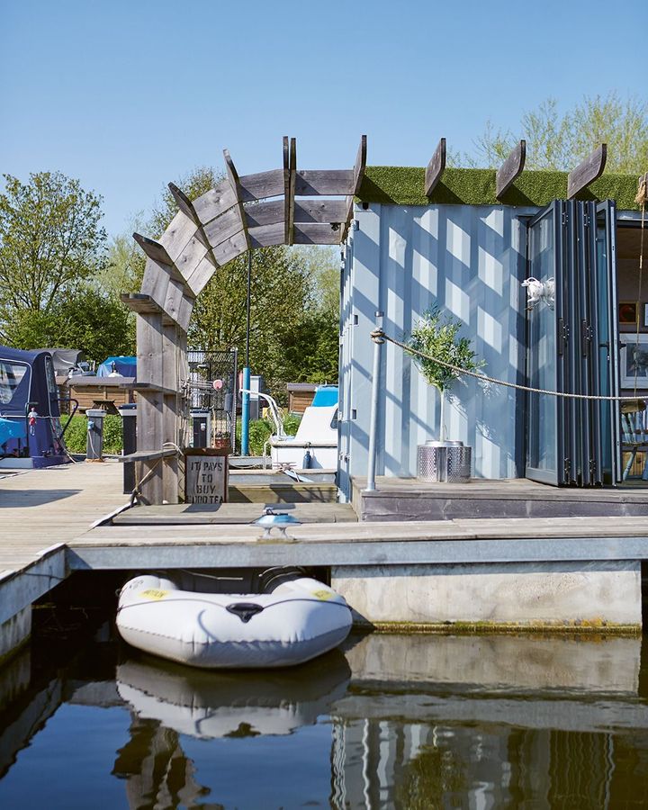 In the UK, Max McMurdo converted a metal shipping container into a floating home (Credit: Brent Darby)