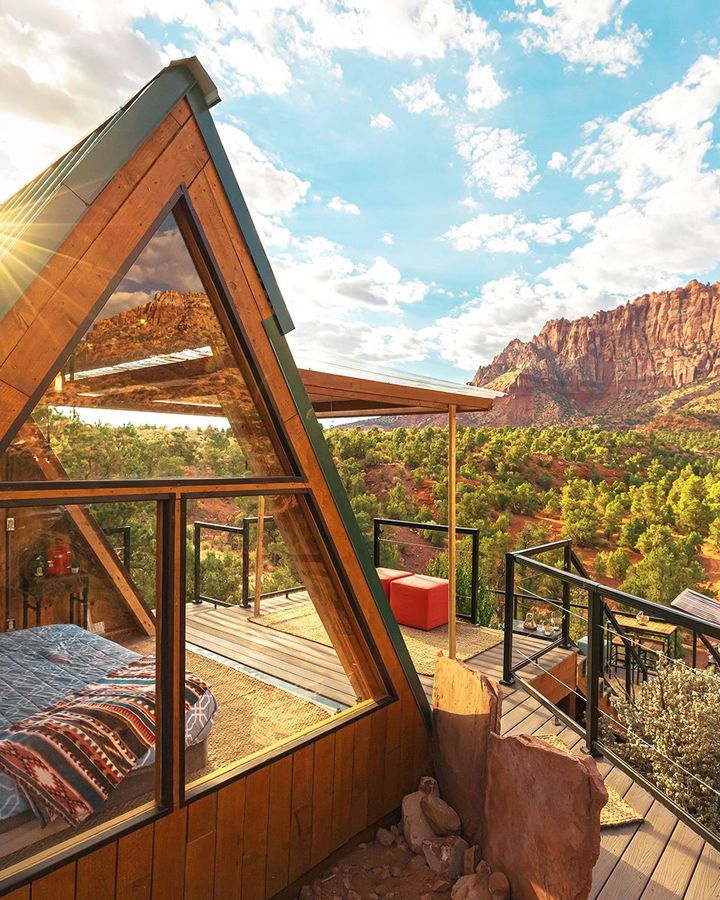 This 144 sq ft (13 sq m) A-frame might be small, but it has a grand backdrop in Zion National Park, Utah, with an entire wall that opens onto the deck (Credit: Ethan Abitz)