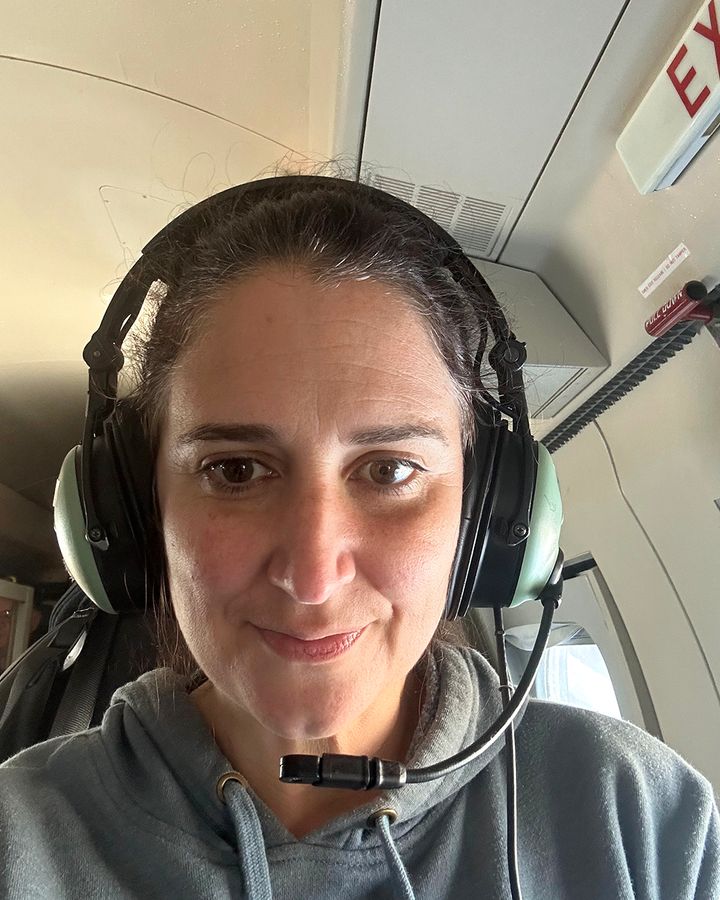 Anna Wilson onboard the Noaa aircraft (Credit: Anna Wilson)