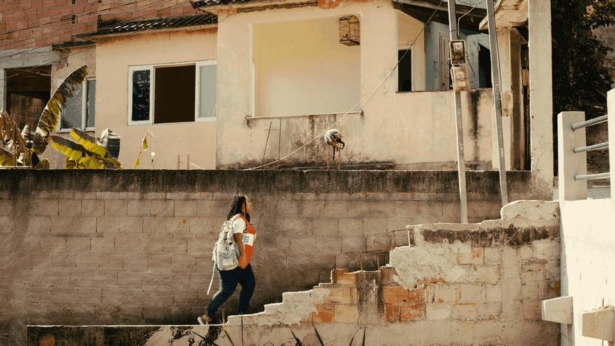 Woman walking up stairs outside Woman walking up stairs outside
