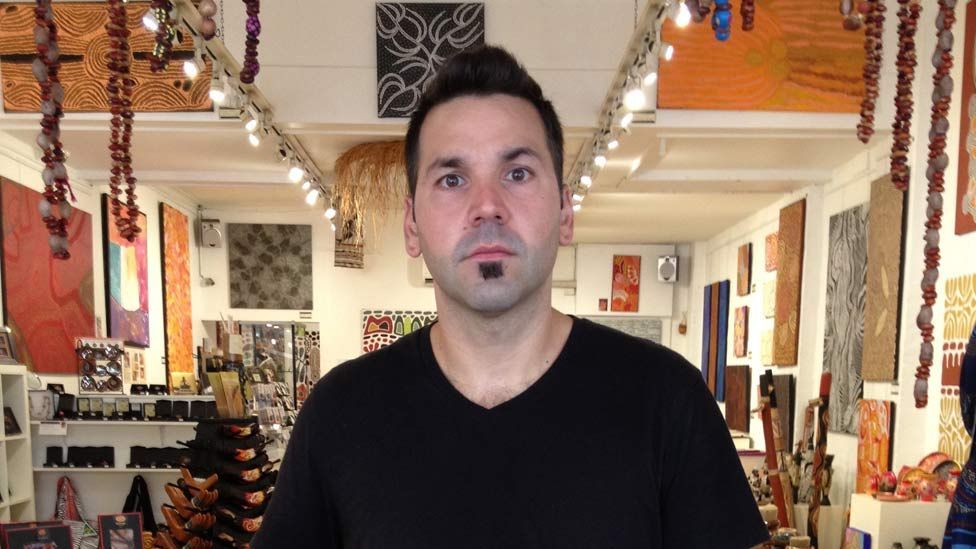 Edwin is the director of an indigenous art gallery in Manly, New South Wales. He is of Armenian heritage but has a deep respect for indigenous art.(Phil Mercer)
