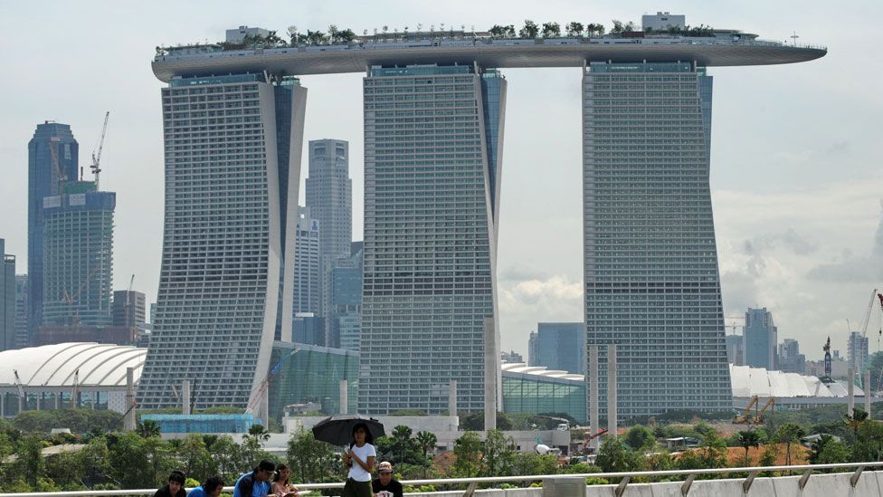 On the 56th floor of the Marina Bay Sands hotel in Singapore is a skypark lined with trees and featuring leisure facilities such as a pool. (Copyright: Getty Images) On the 56th floor of the Marina Bay Sands hotel in Singapore is a skypark lined with trees and featuring leisure facilities such as a pool. (Copyright: Getty Images)